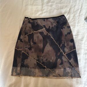 I.AM.GIA Elara camo fishnet mesh mini skirt.